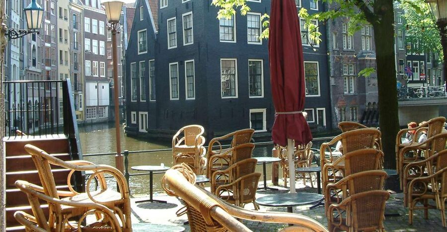 Amsterdam Old City Private Walking Tour - Old walls, canal thinking, and the merchant-house look