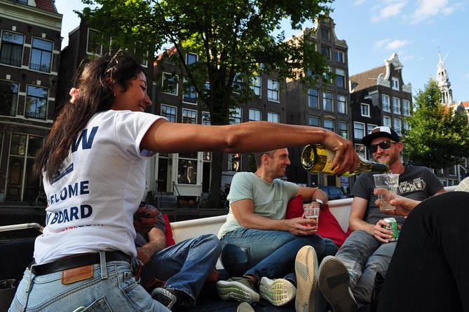 Amsterdam Open Boat Cruise in Old City Center with Live Guide - Boarding at Amstel 51F, right by the Hermitage Museum