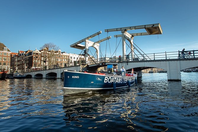 Amsterdam Open Boat Cruise with Live Guide and Two Drinks - Open-air electric boat, heated winter seats, and two included drinks