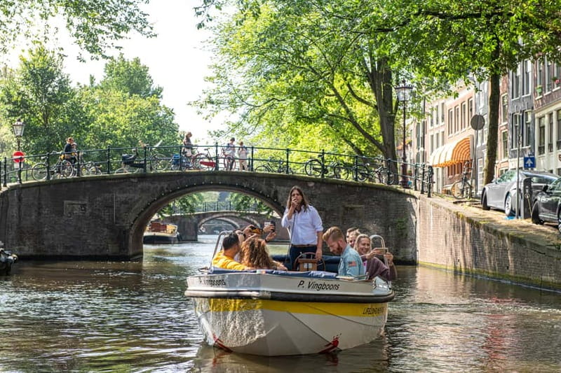Amsterdam: Open Boat Tour of Canals with Expert Local Guide - Why an Open Boat Works Best on Amsterdam Canals