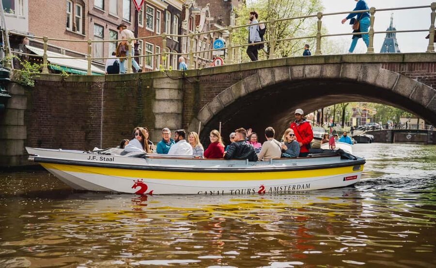 Amsterdam: Open Boat Tour of Canals with Expert Local Guide - Timing, Season, and Weather Reality