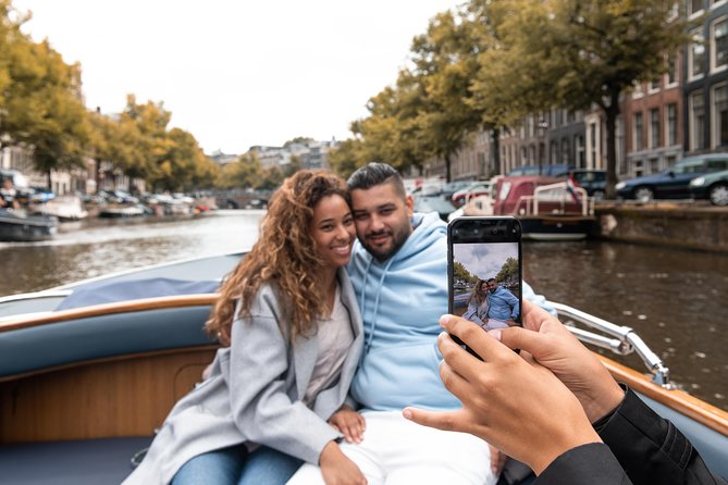 Amsterdam Open Boat Tour with Local Guide - Floating past Amsterdam’s top sights, without the walking workout