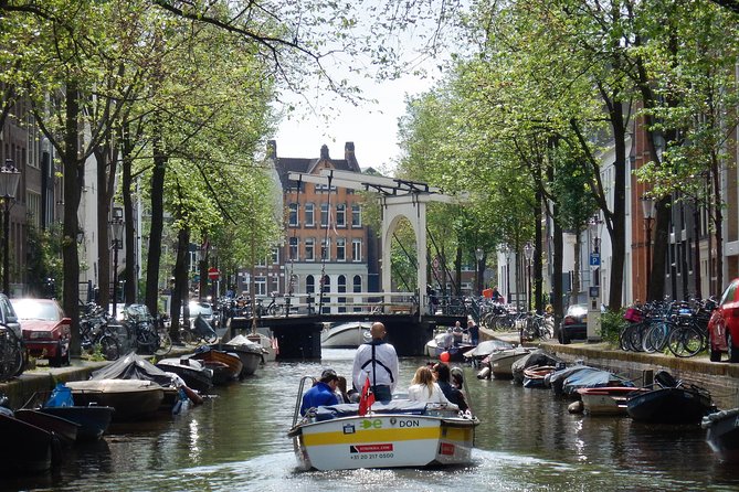 Amsterdam Open Boat Tour with Local Guide - Smart casual is the rule, but wind is the real boss