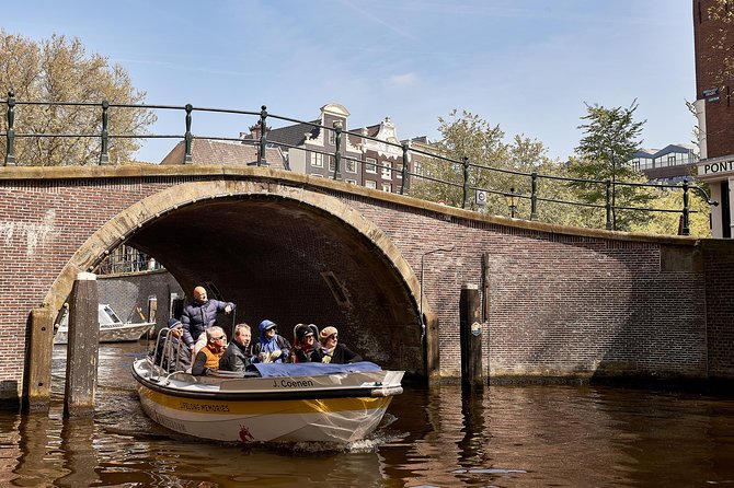 Amsterdam Open Boat Tour with Local Guide - Who should book this Amsterdam open-boat tour, and who might skip
