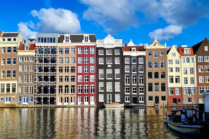 Amsterdam Pedicab City Tour (2 hours) - Nieuwmarkt and Montelbaanstoren: City Gates, Defense Lines, and Canal Drama