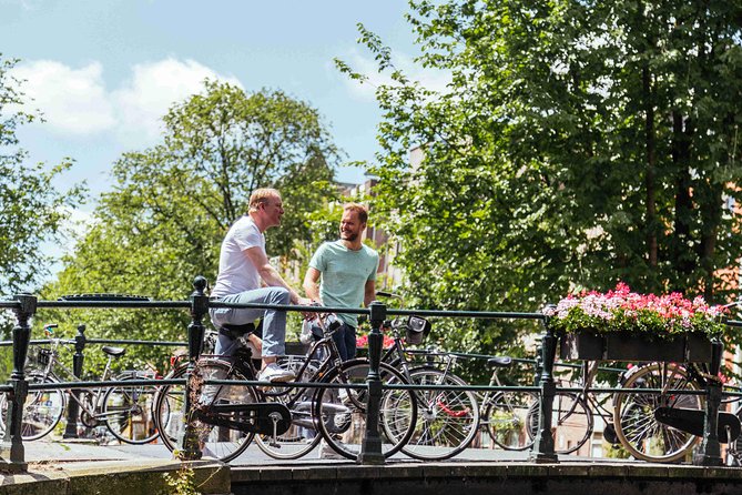 Amsterdam PRIVATE Bike Tour With Locals: Bike & Local Snack Included - Why start near Centraal Station for a bike tour