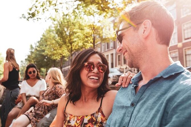 Amsterdam Private Boat Tour with Unlimited Drinks - Onboard comfort, toilets, and canopy reality