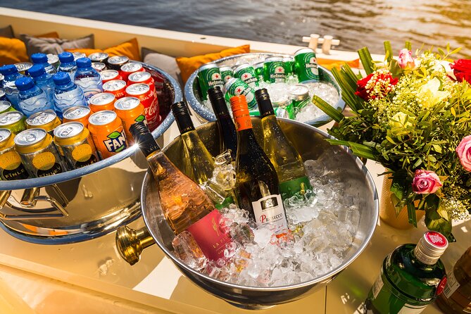 Amsterdam Private Boat Trip with Pizza and Unlimited Drinks - A private canal cruise that starts near Centraal Station