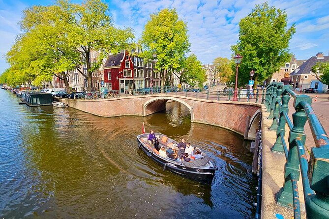 Amsterdam Private Canal Cruise – 90 Minutes through the Old City - Weather protection, comfort, and what to wear