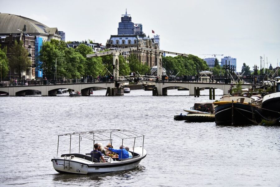 Amsterdam: Private Canal Tour - Rain, the canvas roof, and how to avoid a soggy start