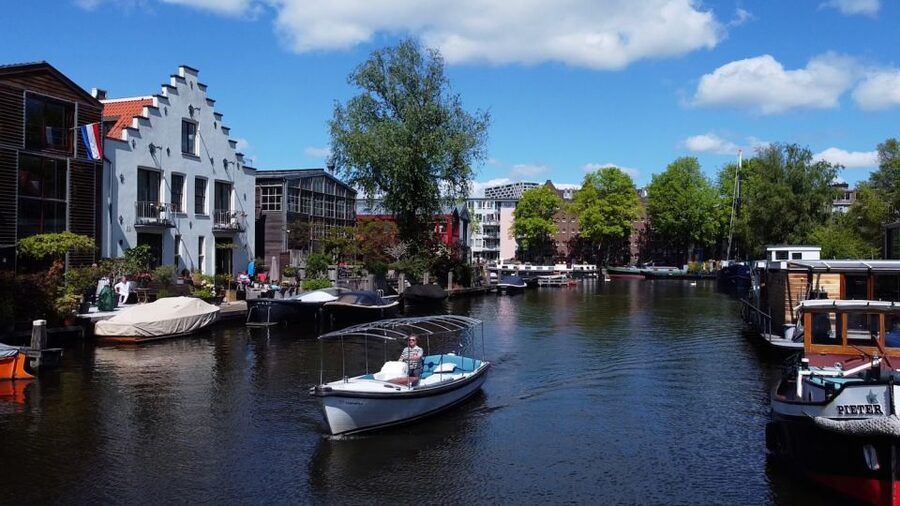 Amsterdam: Private Canal Tour - The photo stops that matter: Seven Bridges, Dancing Houses, and Monet