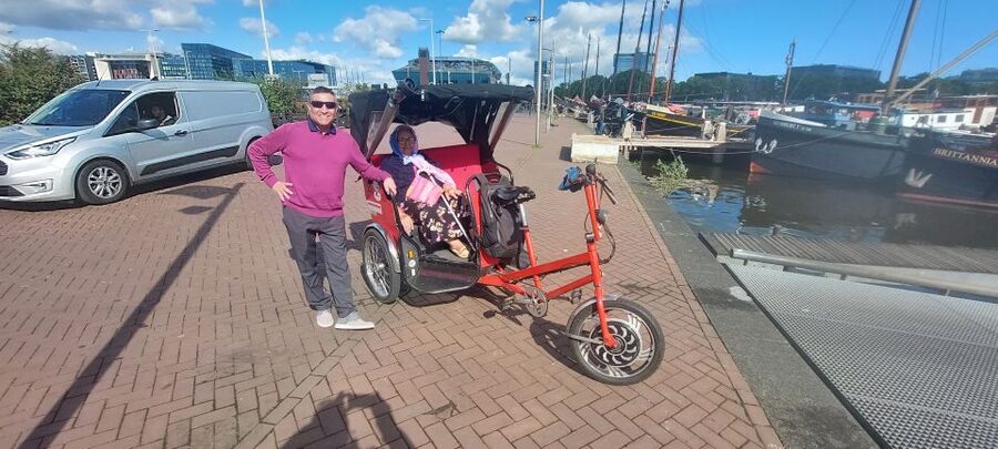 Amsterdam: Private City Highlights Tour by Rickshaw - Red Light District on a guided ride, racy but explained