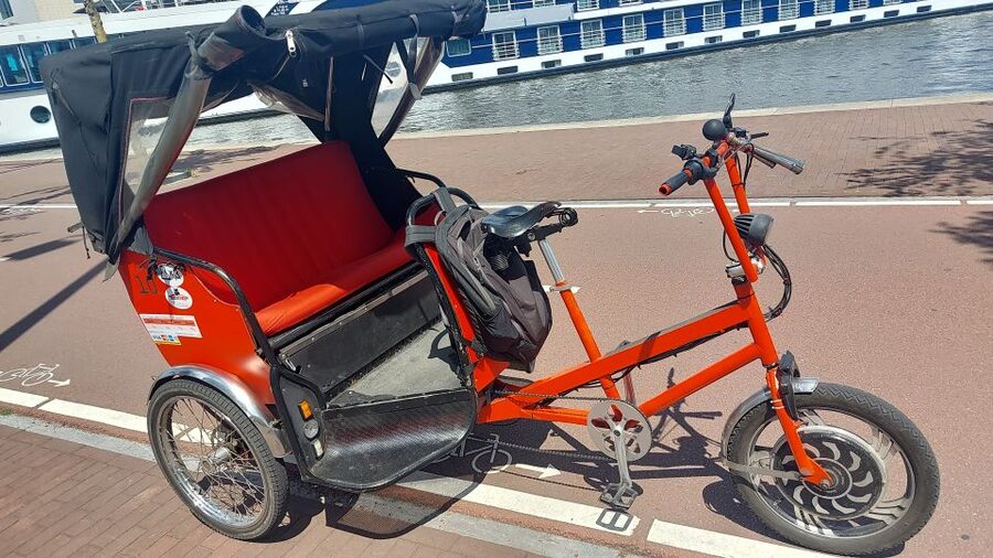 Amsterdam: Private City Highlights Tour by Rickshaw - Dam Square, old-city planning, and why it is the right first stop