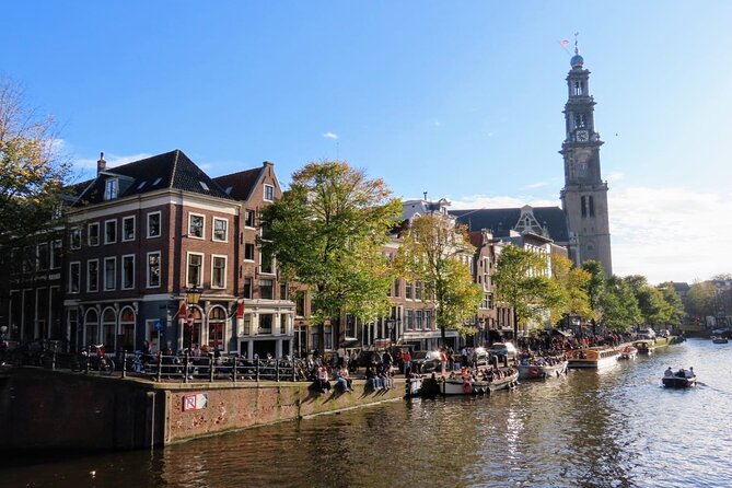 Amsterdam private city walking experience with a local - Centraal Station, architecture plus centuries of connection