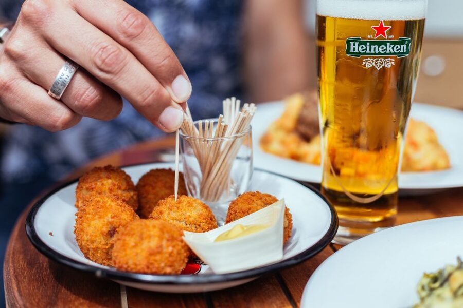 Amsterdam: Private Food Tour with a Local - Dutch comfort food hits: stroopwafel and bitterballen