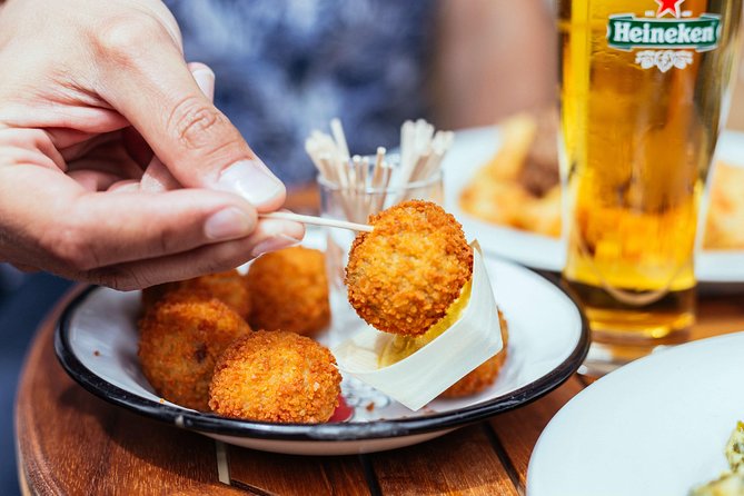 Amsterdam Private Food Tour with Local Including 6 or 10 Tastings - The cafe moment in the Pijp area: drinks, stories, and a breather