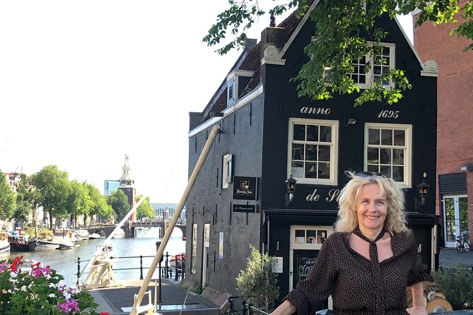 Amsterdam private guided tour with Marieke, local guide - Dam Square stop: the founding core and the Royal Palace area