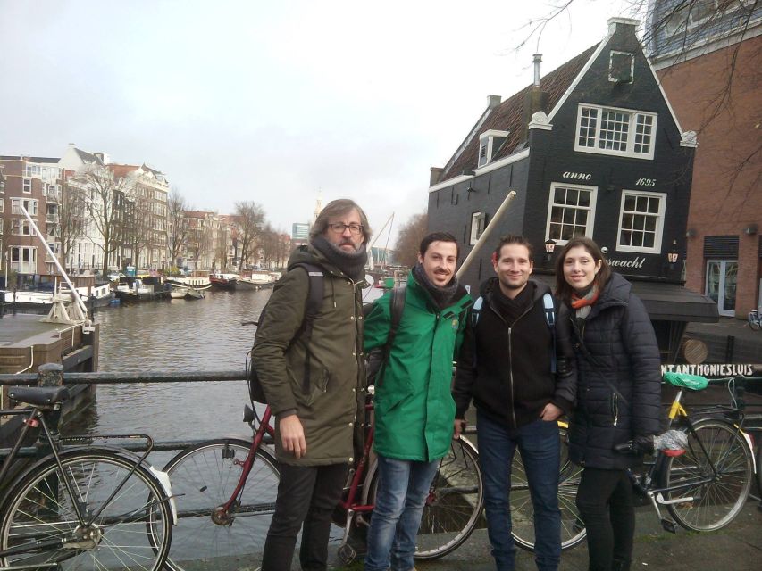 Amsterdam: Private Guided Walking Tour - The Canal Belt: houseboats, bridges, and the city’s trade route vibe