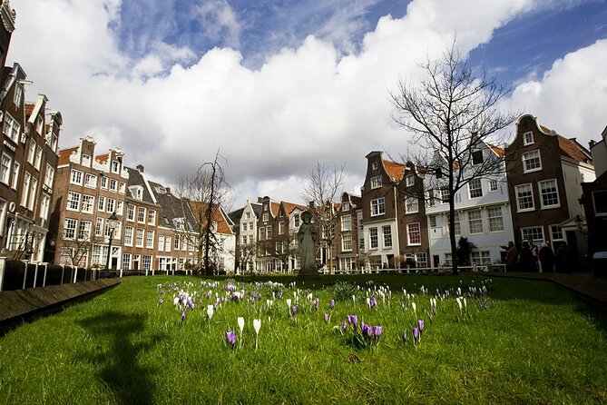 Amsterdam Private Historical Walking Tour - Bloemenmarkt: the largest floating flower market in one stop