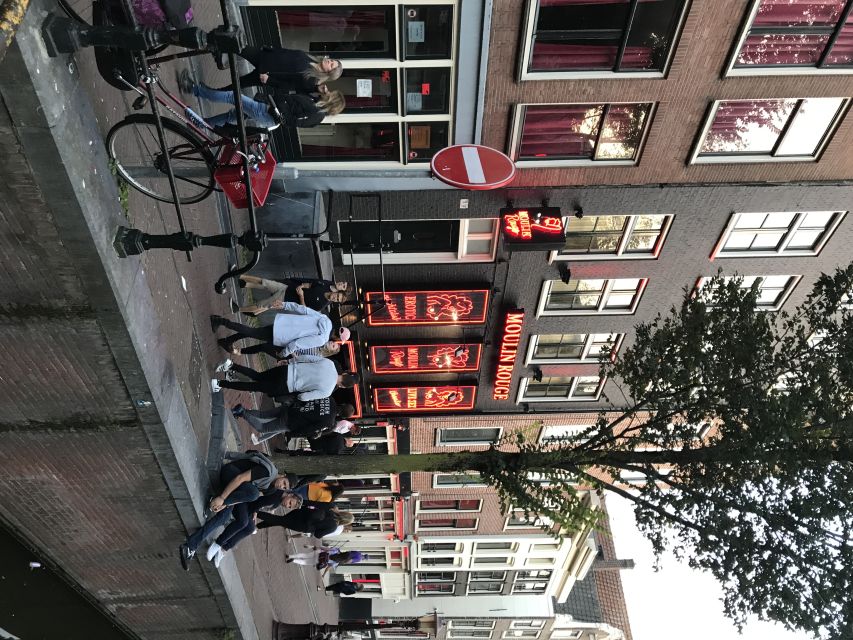 Amsterdam: Private Red Light District and Food Tour - Food tastings: kroket, Dutch cheese, and stroopwafel