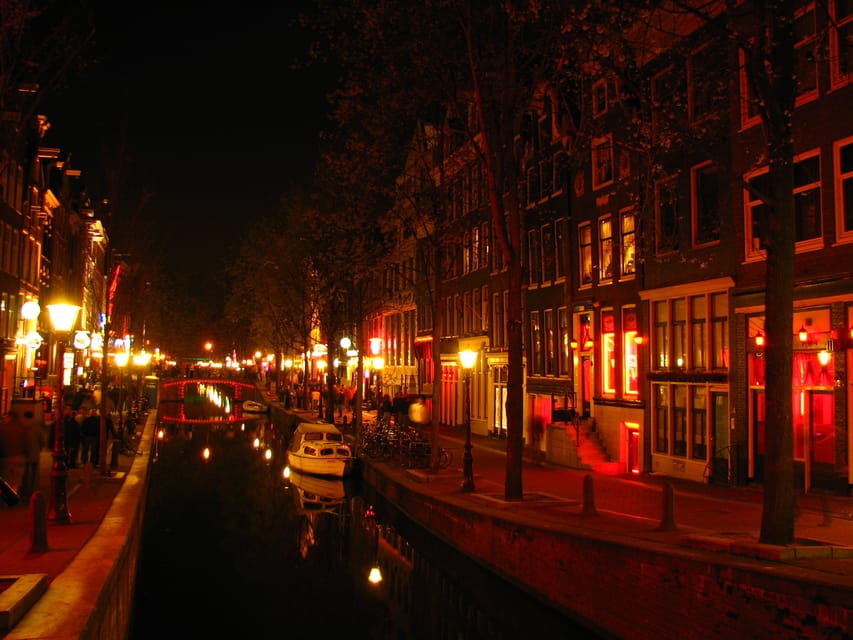 Amsterdam: Private Red Light District Tour in Spanish - Meeting at Prins Hendrikkade: Start Where the City Feels Real