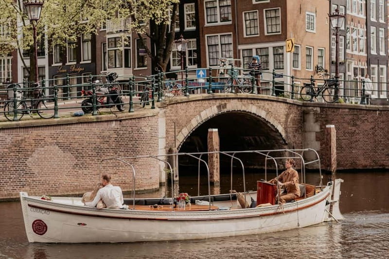 Amsterdam: Private Romantic Canal Cruise w. Prosecco/Snacks - What the Boat Experience Feels Like On the Water