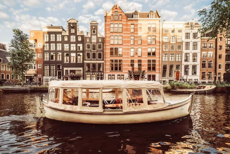 Amsterdam: Private Romantic Canal Cruise w. Prosecco/Snacks - Skinny Bridge, the Seven Bridges of Love, and the Art-Love Stories