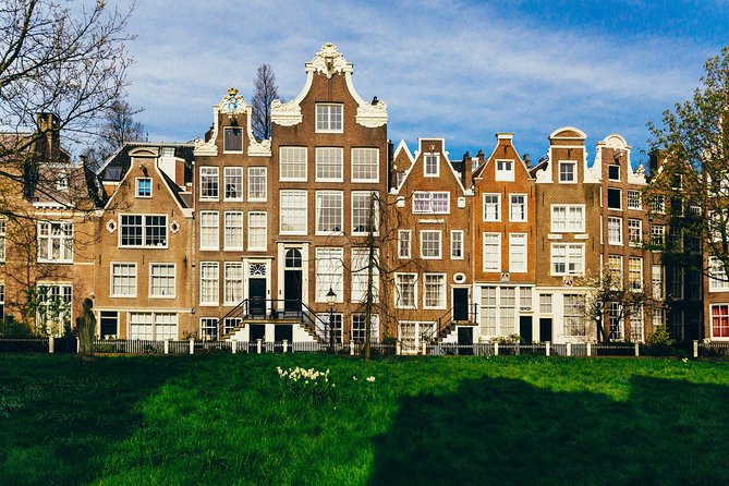 Amsterdam Private Tour: Highlights & Hidden Gems by Bike or Foot - Flower Market stalls and the craft of making beauty last