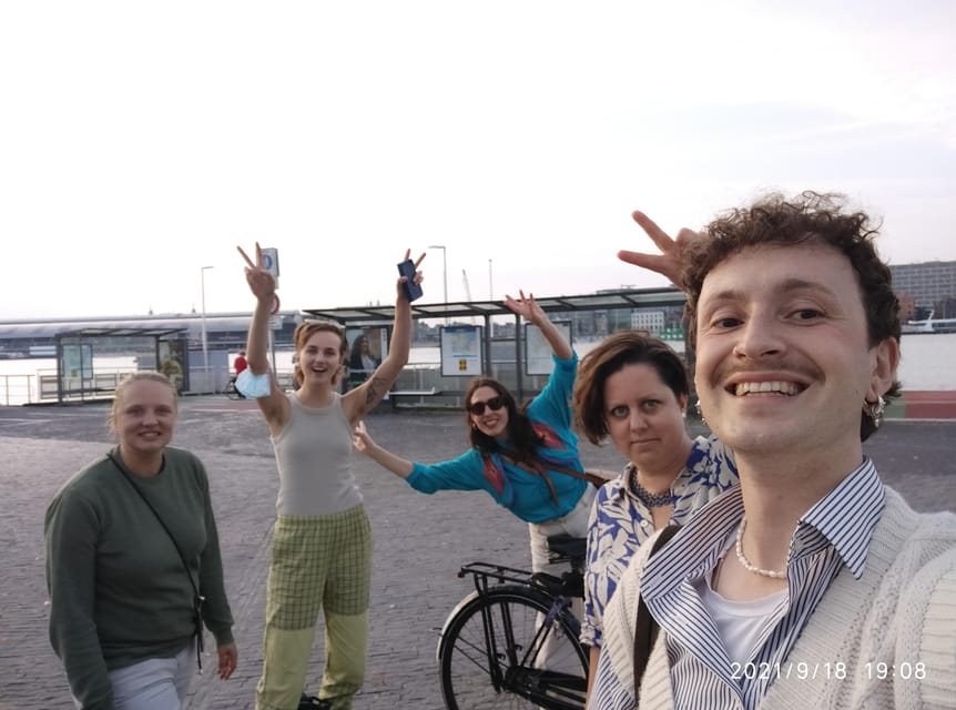 Amsterdam: Rainbow Rural Bike Tour With Local Gay Guide - The windmill stop and Dutch waterworks, where the big story is practical