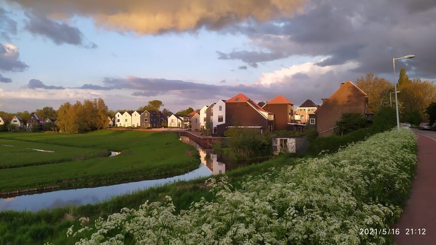 Amsterdam: Rainbow Rural Bike Tour With Local Gay Guide - Polders, dykes, and panoramic views that make the countryside feel close