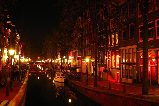 Amsterdam Red Light District and City Center Walking Tour - The Dam and Amsterdam’s wooden-pole foundation: a history lesson you can see