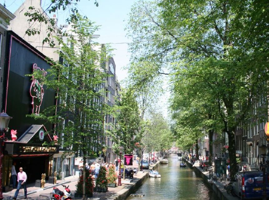 Amsterdam: Red Light District and Coffeeshop tour - Red Windows and the Rules Behind Them