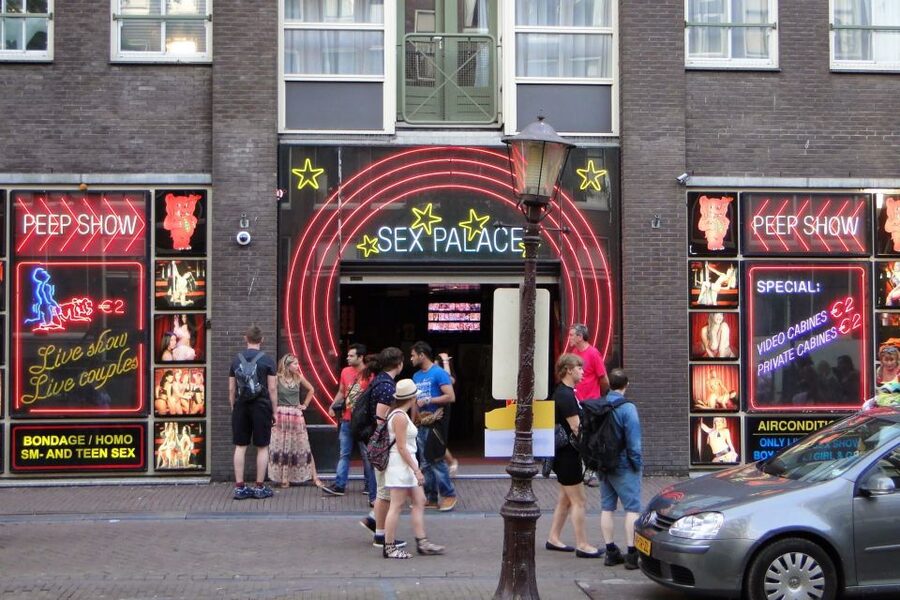 Amsterdam: Red Light District and Local Pub Tour - The center of the Red Light District: peep shows, sex work stories, and modern rules