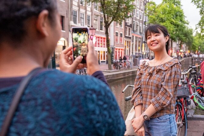 Amsterdam: Red Light District & City Tour (Private tour) - Chinatown and coffee shops: culture, politics, and mass tourism