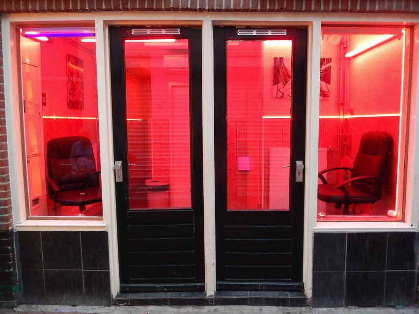 Amsterdam: Red Light District Exclusive Night Tour - Casa Rosso and the Condomerie: seeing adult venues with context