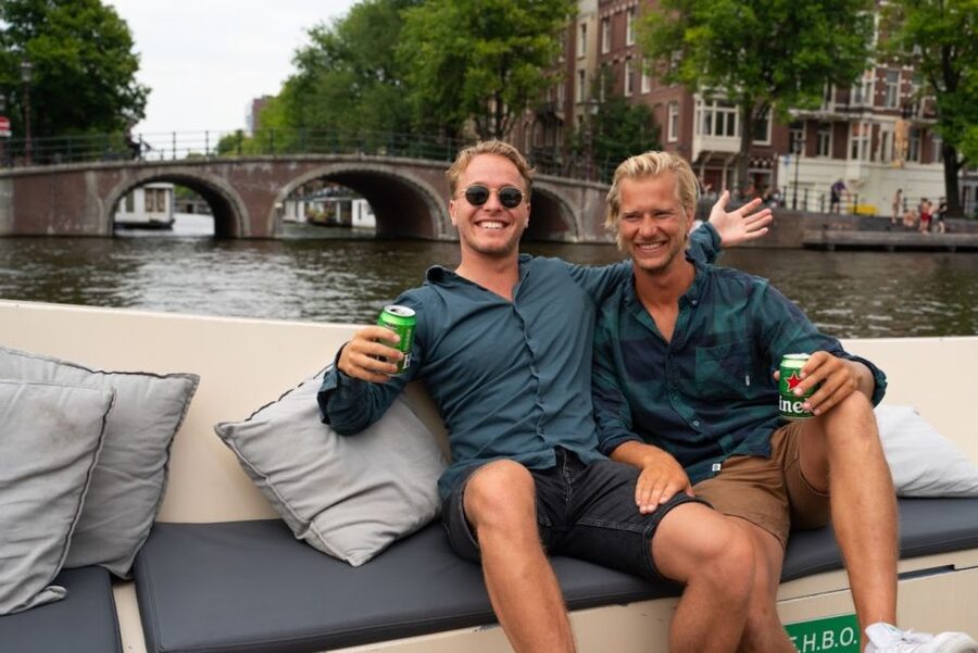 Amsterdam: Red-Light District Pub Crawl and Booze Boat Tour - The Starboard booze boat: canals, open bar, and a guided vibe
