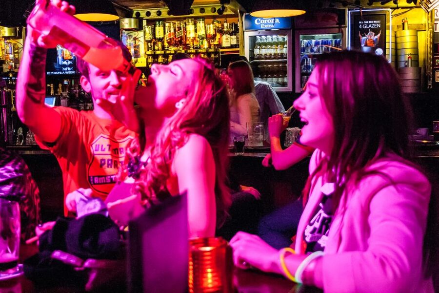 Amsterdam: Red Light District Pub Crawl with Unlimited Shots - Four pubs plus a nightclub: what each part usually delivers