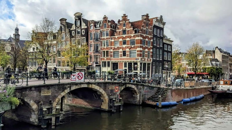 Amsterdam: Rembrandt & Van Gogh walking tour - Nieuwmarkt Square to Het Trippenhuis: Amsterdam’s street-level art lesson