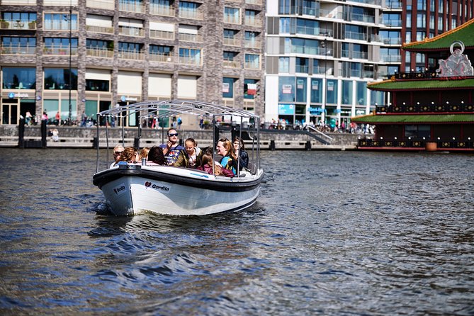 Amsterdam Revealed in Portuguese: 2 Hours of Great Exploration - Getting on board at Prinsengracht 375, and why location matters