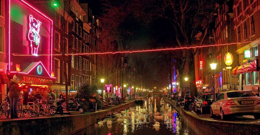 Amsterdam: Sex, Drugs, and Freedom Walking Tour - The Old Church and Condomerie stops that signal the tour’s tone