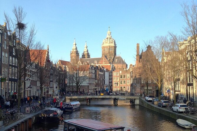Amsterdam Sightseeing Tour + Hidden Gems + Tastings + PDF guide - Spui herring stand, Begijnhof, and Damrak tastings: food meets place