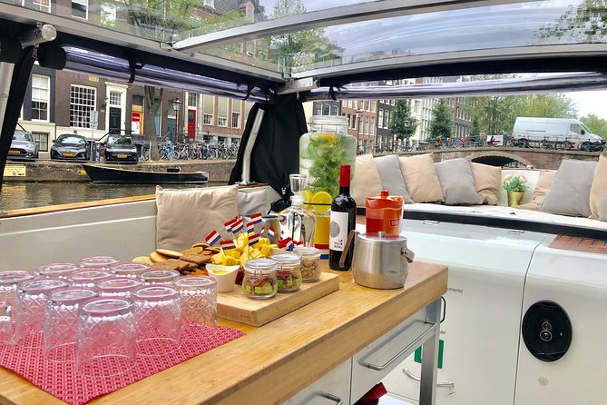 Amsterdam Small-Group Breakfast Morning Cruise - Luxury sloop comfort, small-group rules, and the Keizersgracht 401 meeting point