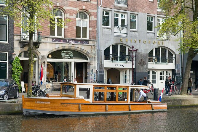 Amsterdam small-group canal cruise in 1920s saloon boat - A 1928 Canal Limousine With Electric Quiet