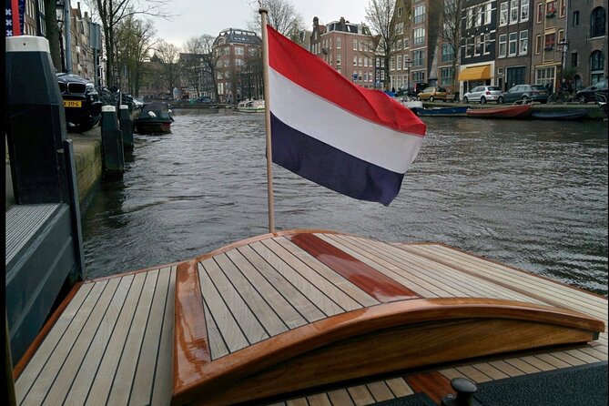 Amsterdam small-group canal cruise in 1920s saloon boat - Keizersgracht and Reguliersgracht: your “read the city” moment