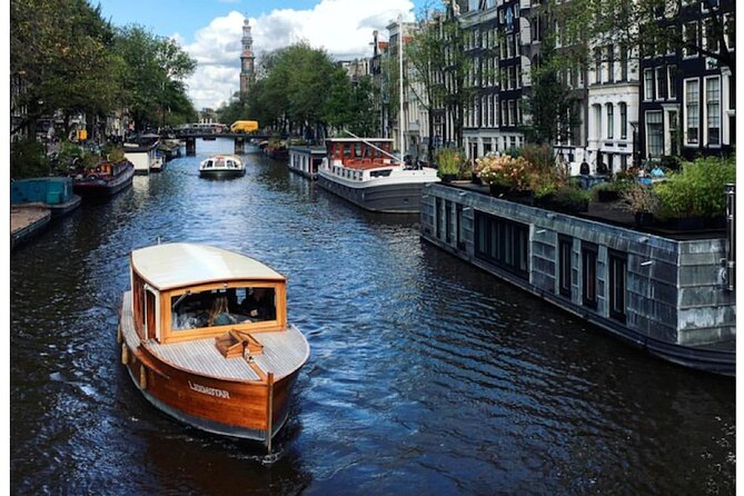 Amsterdam small-group canal cruise in 1920s saloon boat - Boat comfort: heater, blankets, covered seating, and drink upgrades