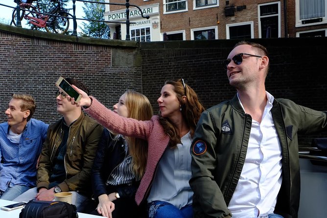 Amsterdam Small-Group Canal Cruise Including Snacks and Drinks - Boarding at Keizersgracht 401, then straight onto the canal loop