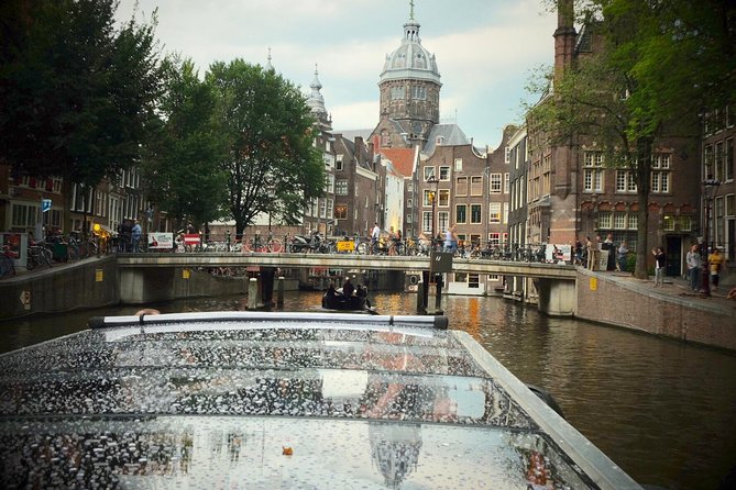 Amsterdam Small-Group Canal Cruise Including Snacks and Drinks - Hortus Botanicus and the quieter side of the city