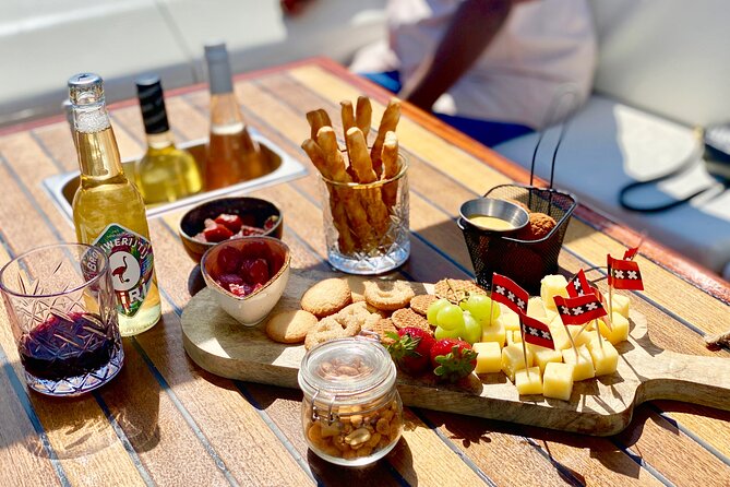 Amsterdam Small-Group Canal Cruise Including Snacks and Drinks - Dutch snacks and an open bar that actually feels included