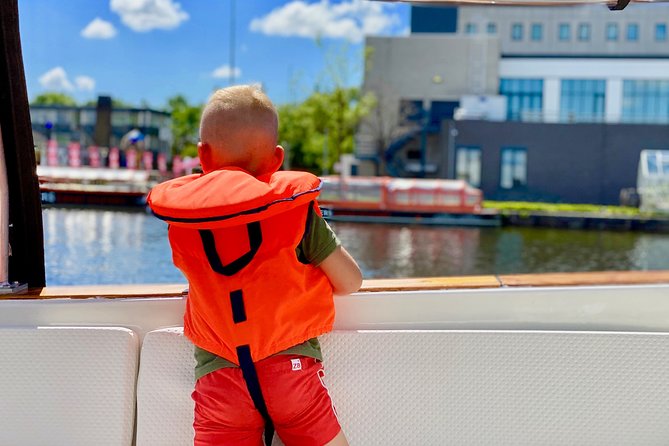 Amsterdam Small-Group Canal Cruise Including Snacks and Drinks - Timing, weather comfort, and what to expect on cooler days