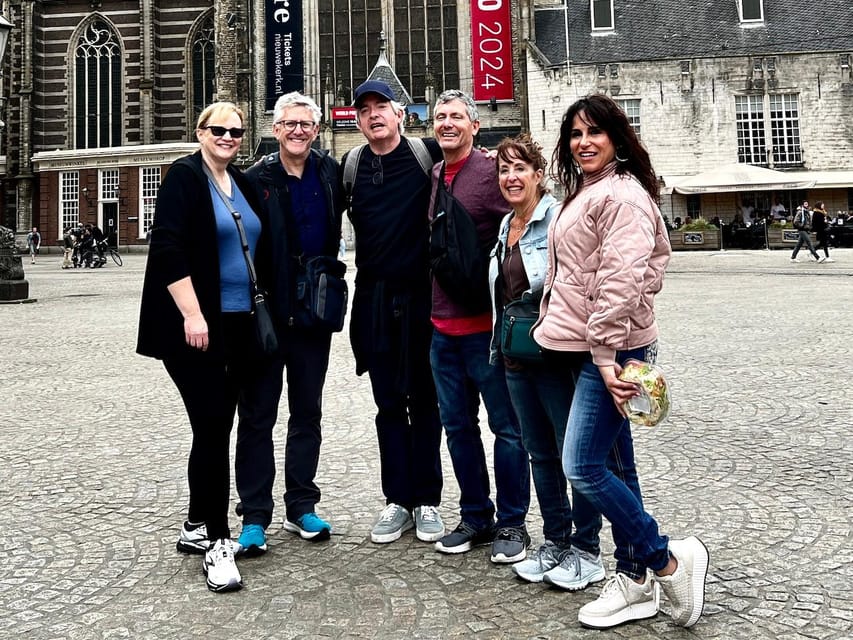 Amsterdam: Small Group Walking Tour with Fun Guide - Mid-tour coffee break, brown cafés, and getting your photos right